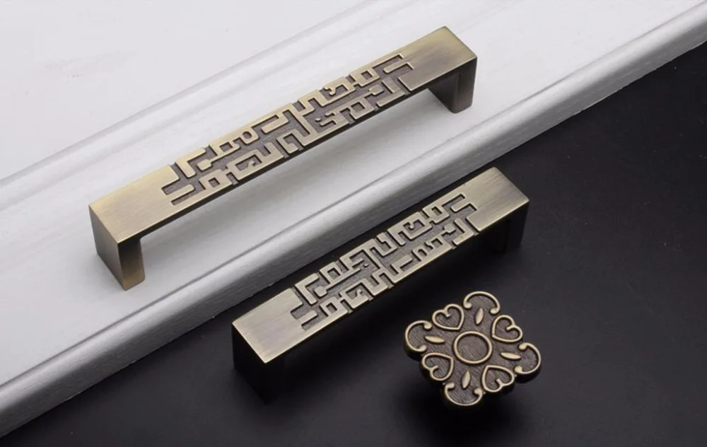 Tirador de cajón de estilo chi - Unique Furniture Hardware reseña y precio