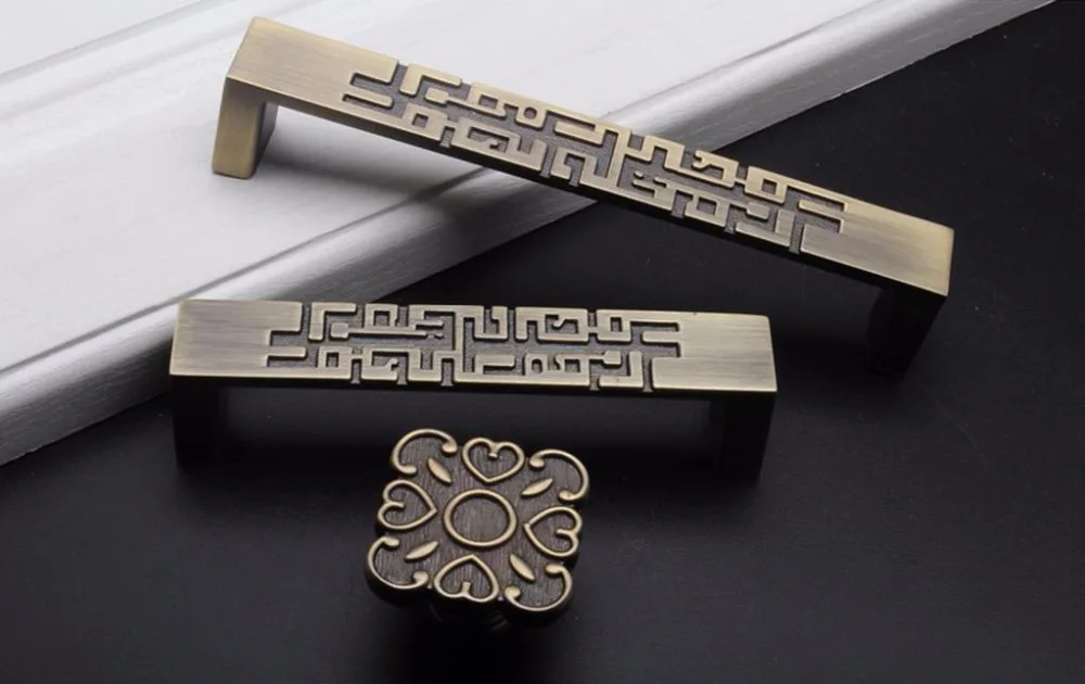 Tirador de cajón de estilo chi - Unique Furniture Hardware reseña y precio