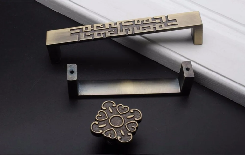 Tirador de cajón de estilo chi - Unique Furniture Hardware reseña y precio
